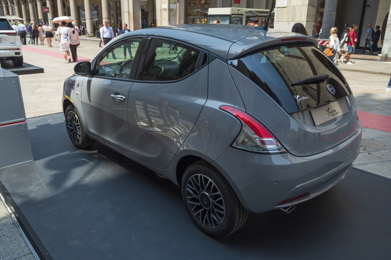 Rear and side view with distinctive taillights and alloy wheels