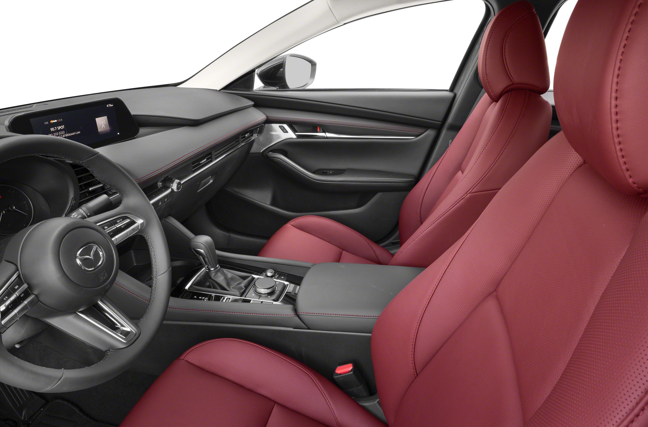 Red leather seats and modern dashboard with infotainment system