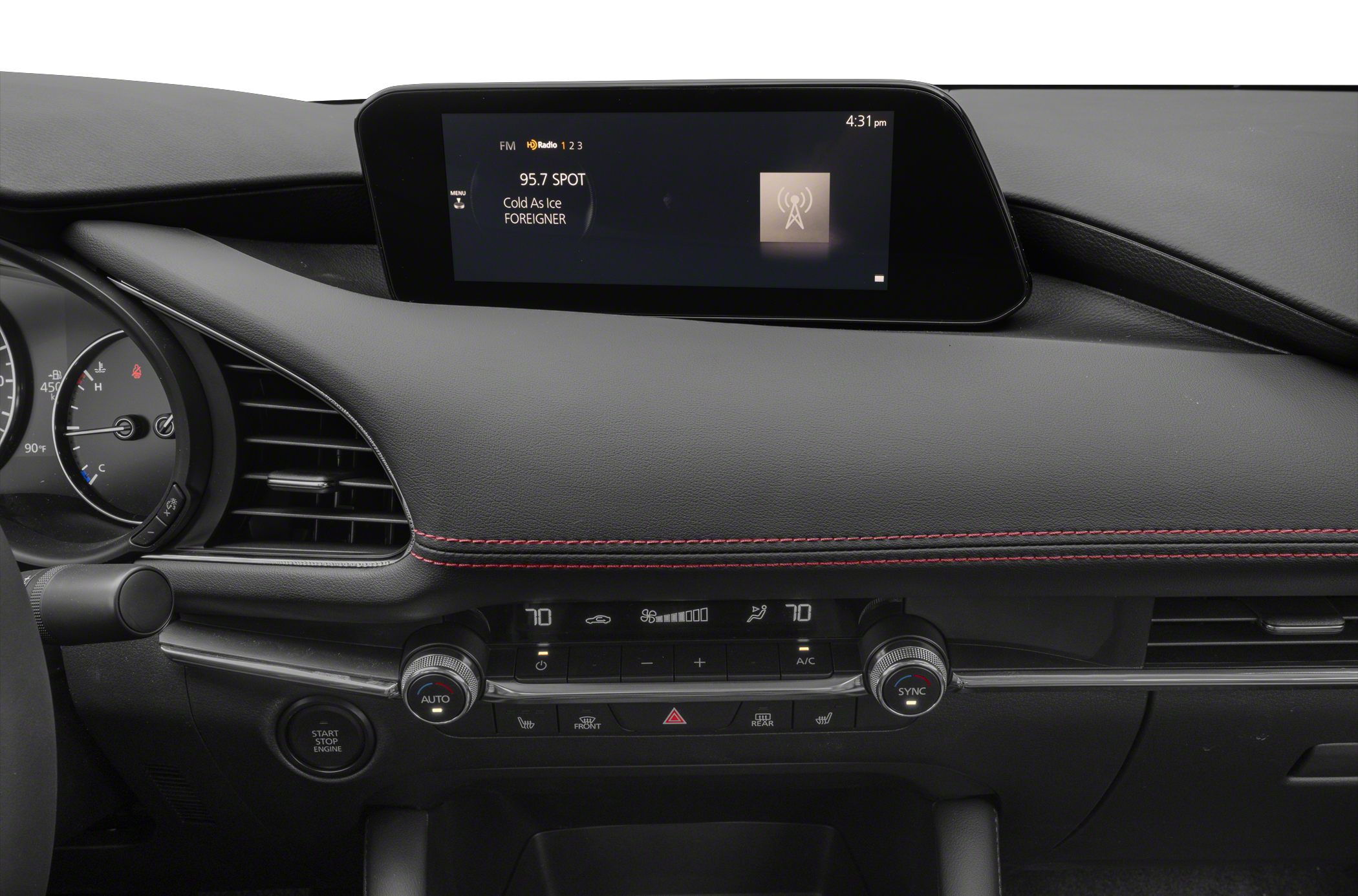 Infotainment screen and dual-zone climate control panel with red stitching
