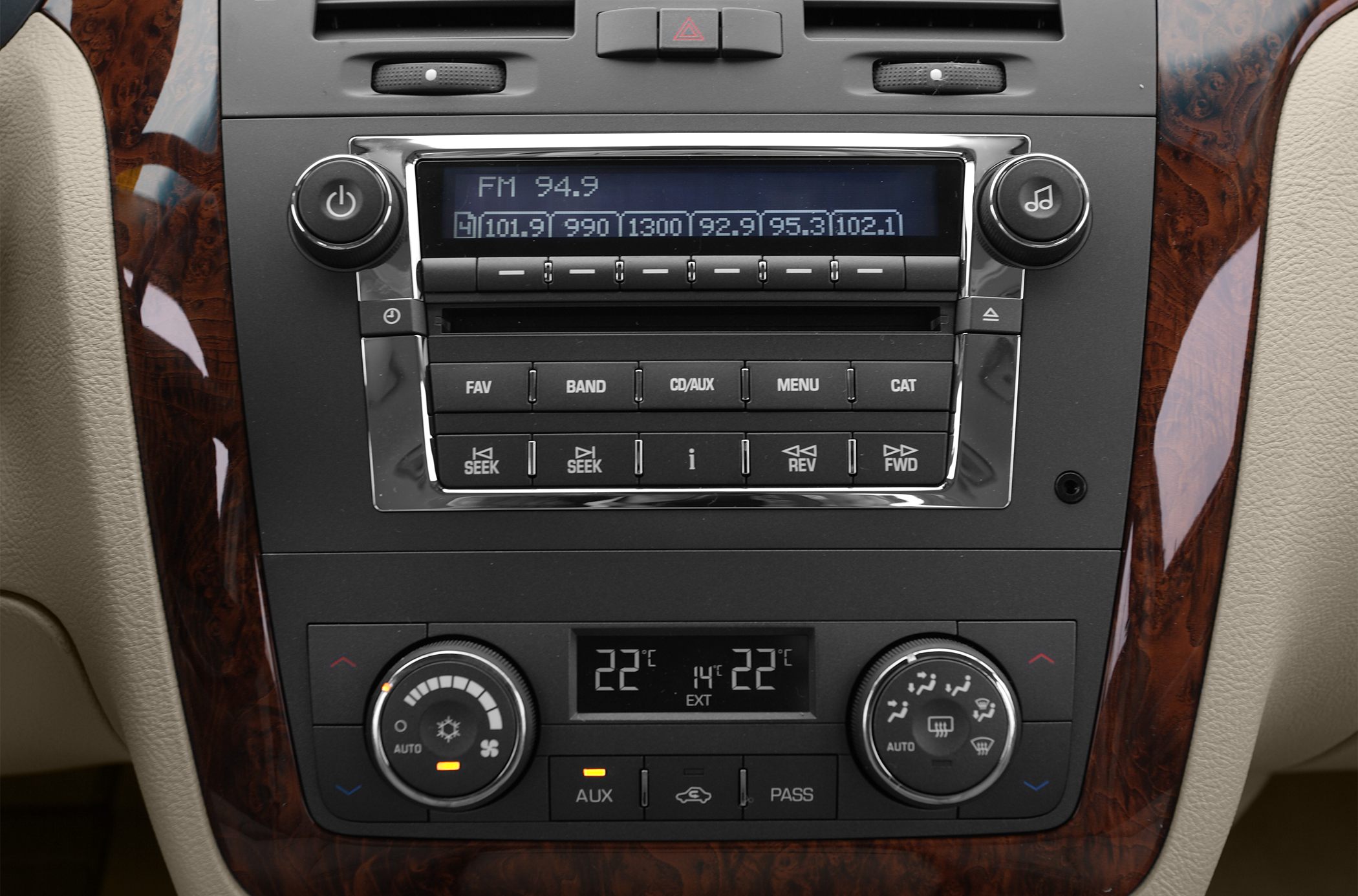 Dashboard radio controls and dual-zone climate control system