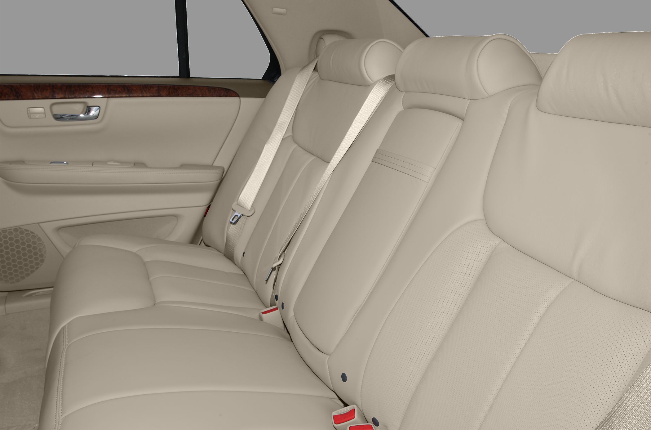 Beige leather rear seats with wood trim door panel