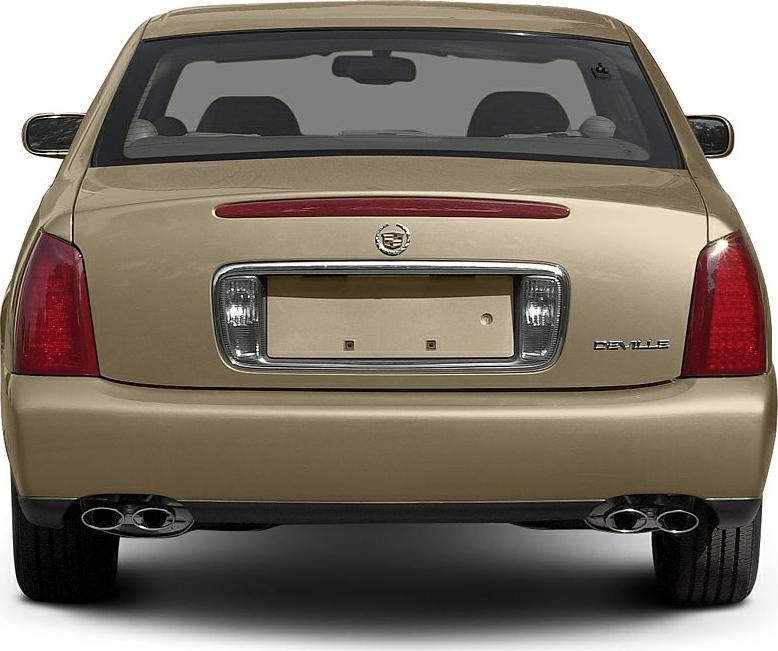 Rear view showing tail lights and dual exhaust of a sedan