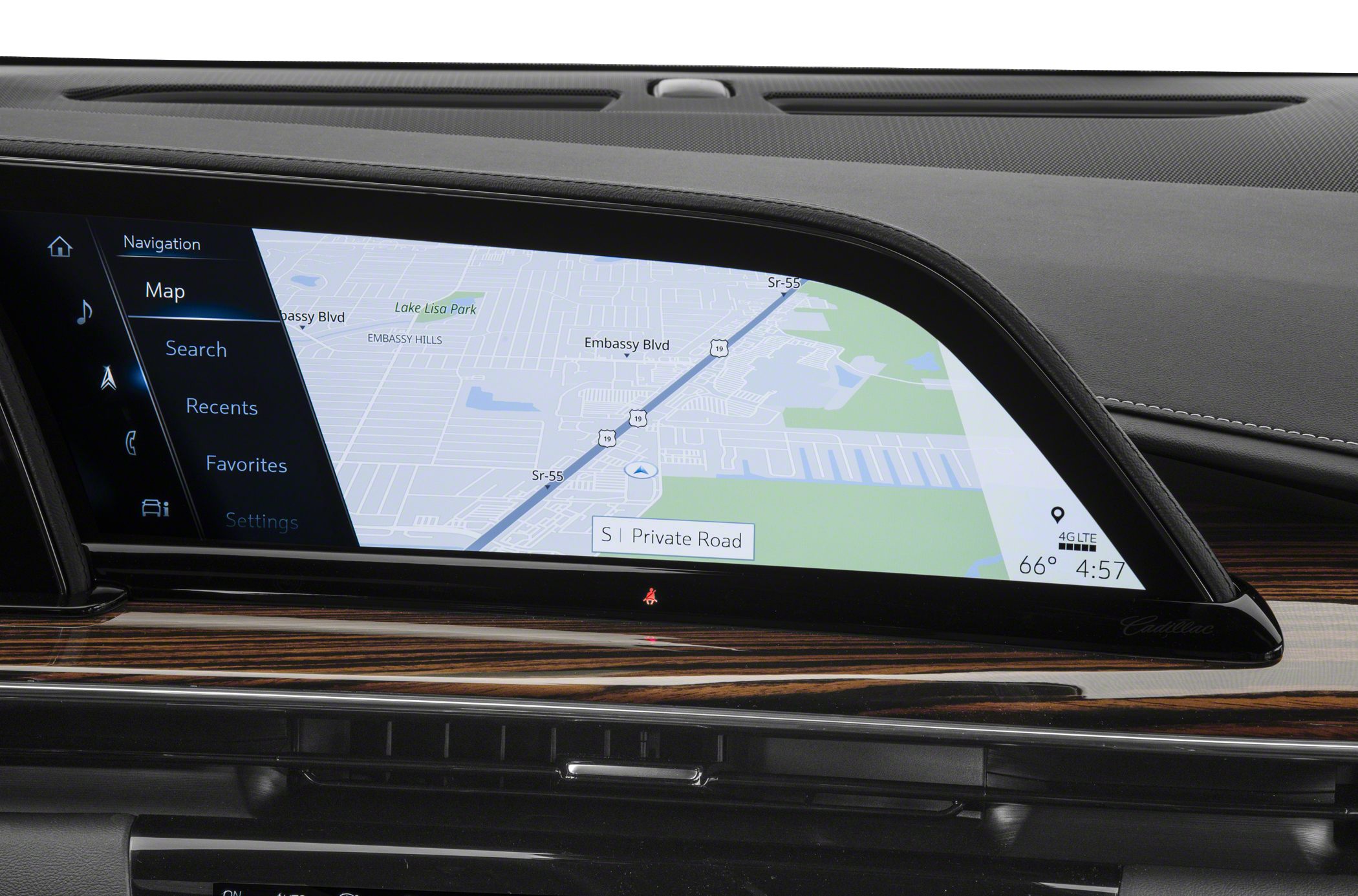 Wide curved navigation screen with digital map and touchscreen menu.