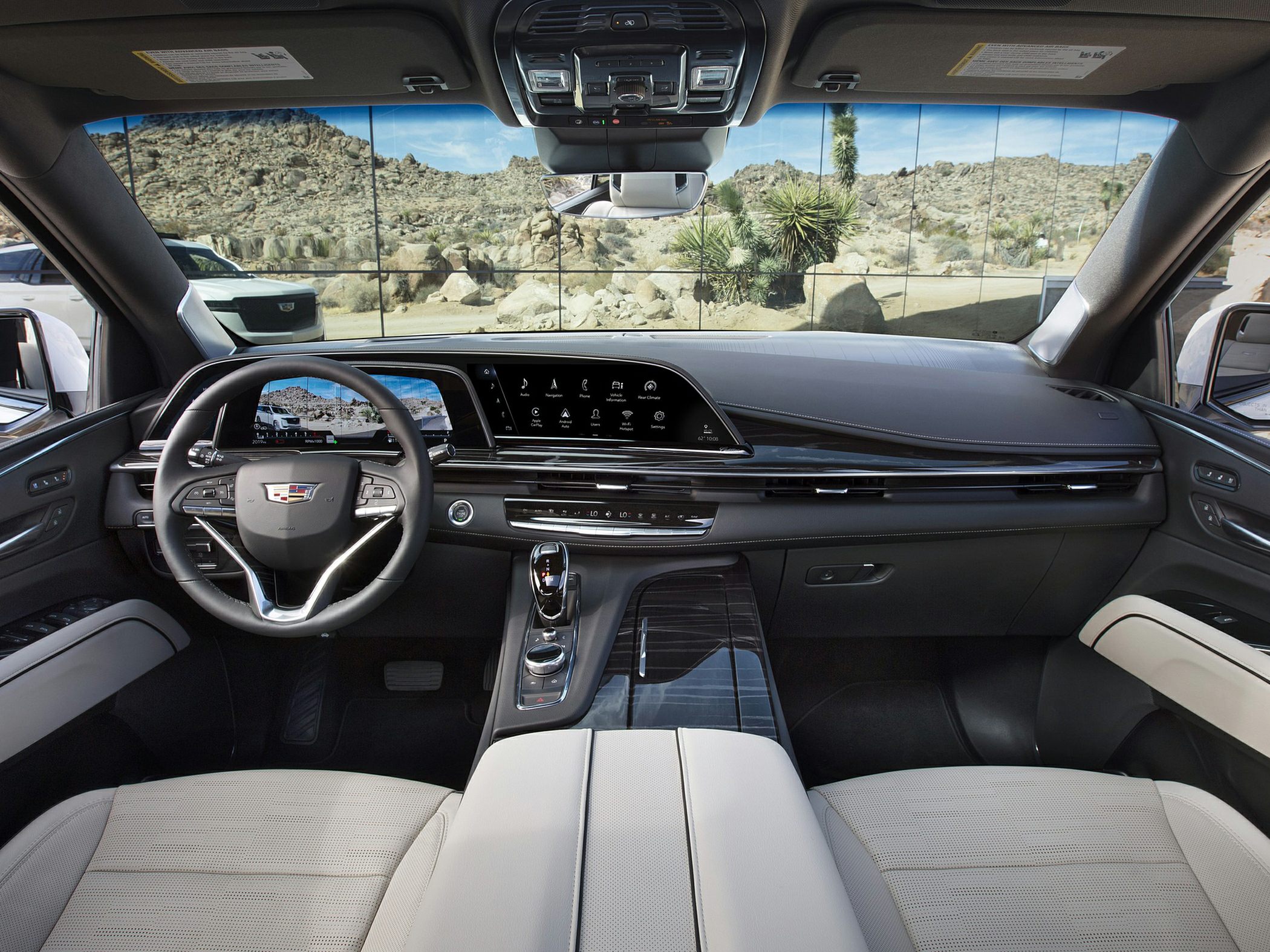Digital cockpit with widescreen displays and luxury seating interior