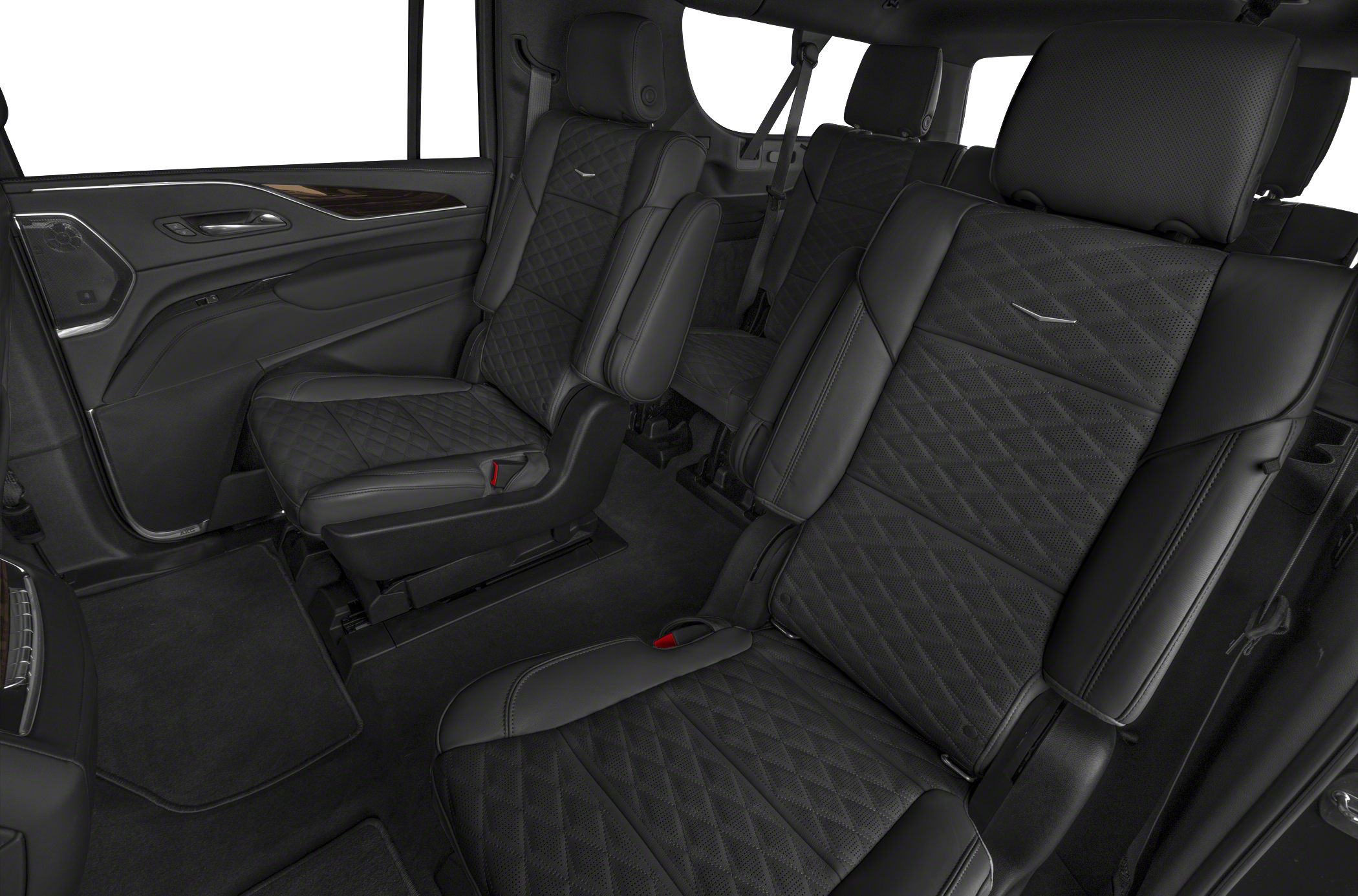 Black quilted diamond-stitched leather captain seats in spacious rear cabin