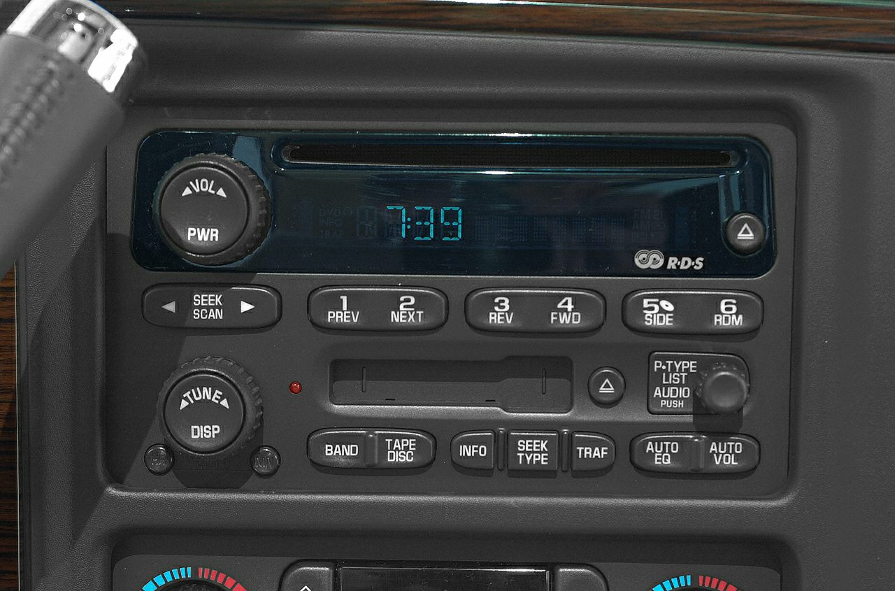 Car stereo system with tape deck and digital clock