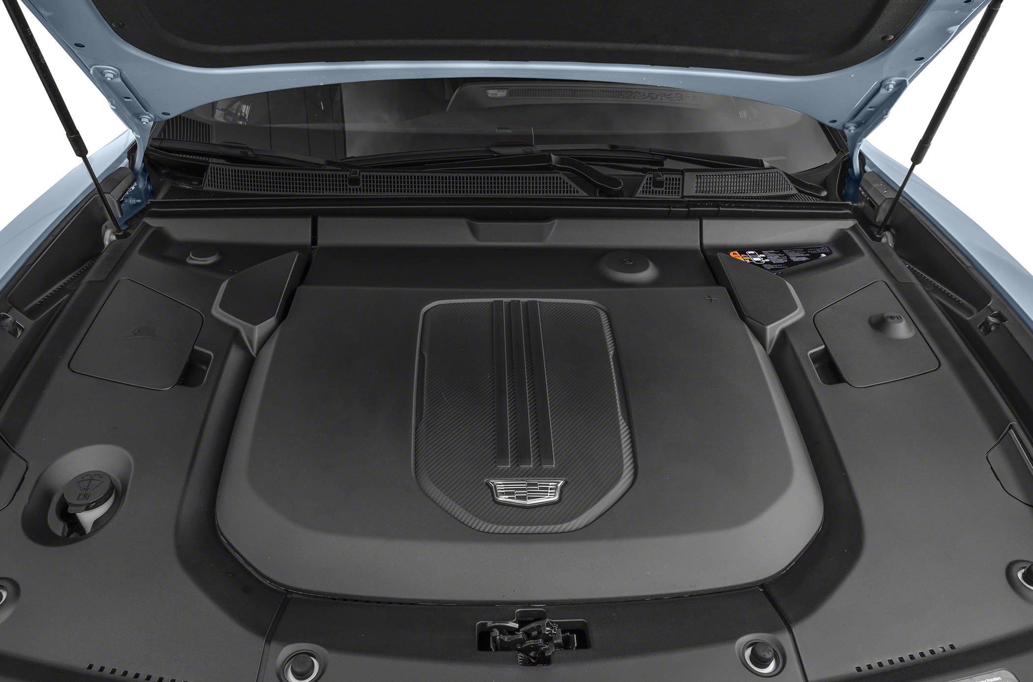 Covered electric powertrain under hood with sleek design and Cadillac emblem