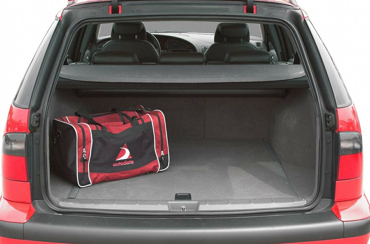 Open trunk space with interior cargo cover and duffle bag