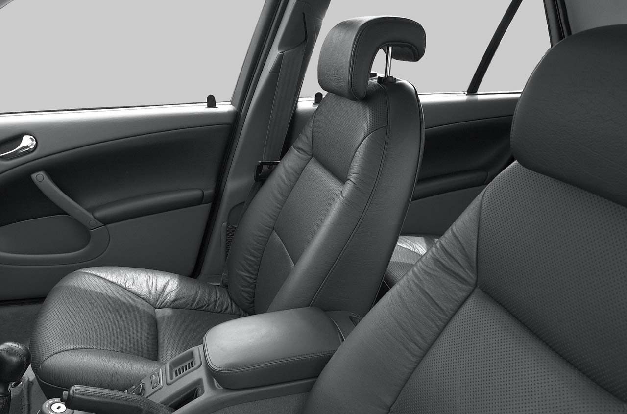 Leather seats and door panel interior with armrest and headrest