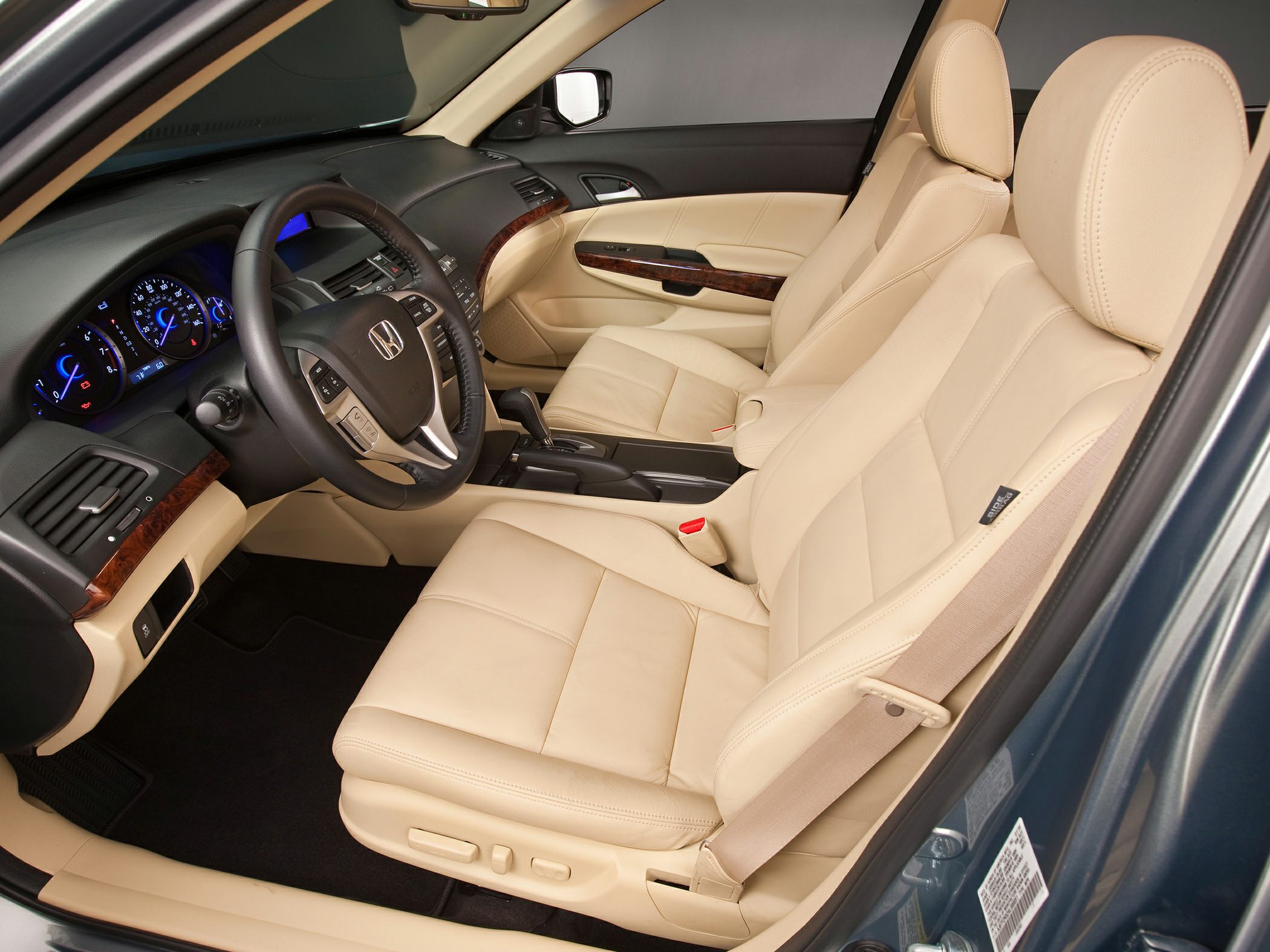Beige leather seats and modern dashboard in a car interior