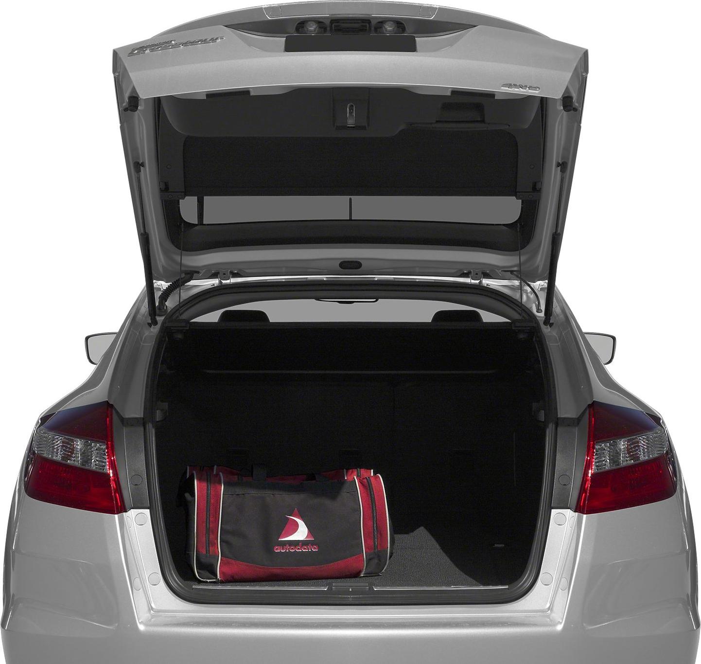 Open tailgate showing spacious trunk interior with a bag inside.