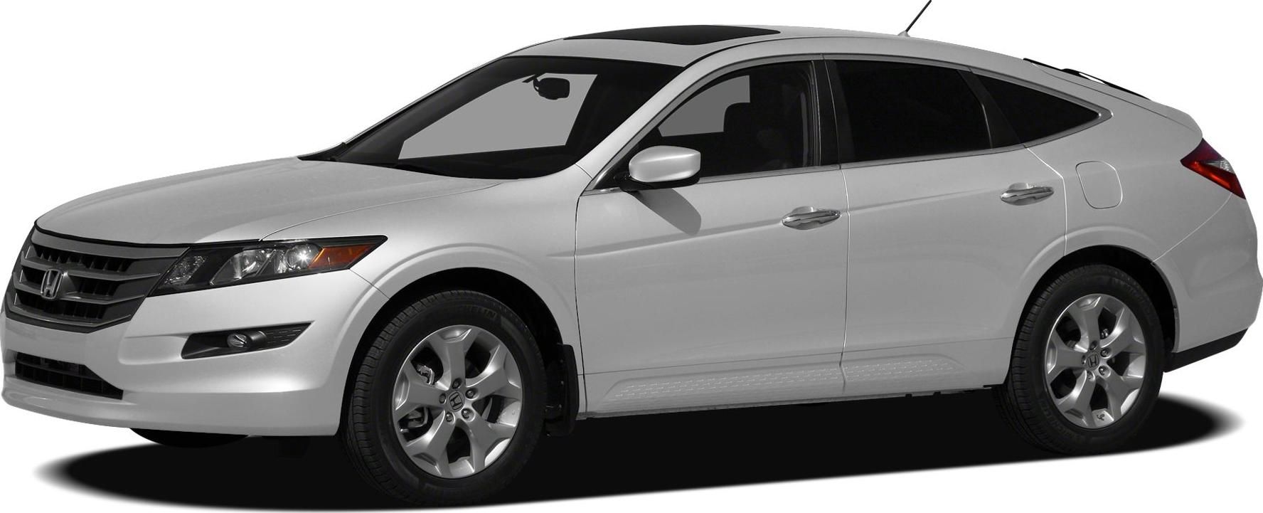 Front side angle with prominent roofline and alloy wheels