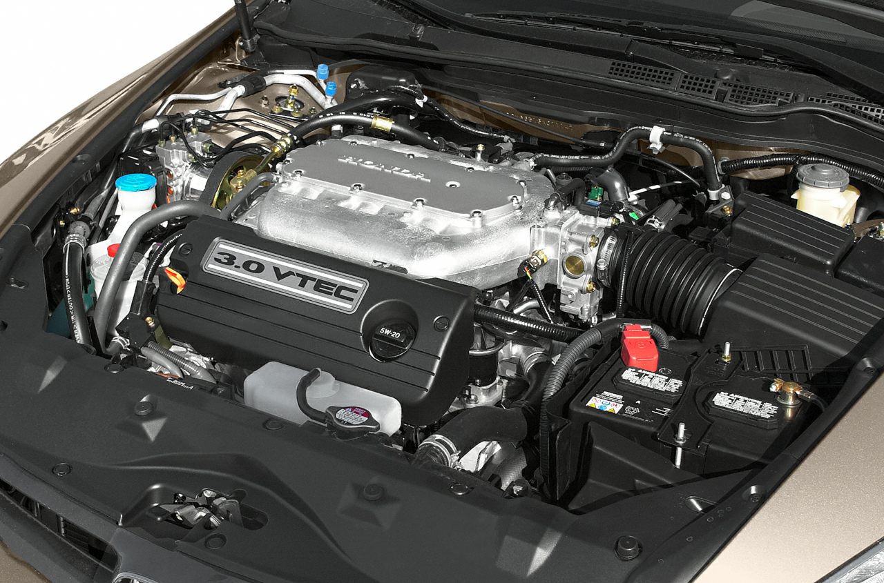 3.0 VTEC engine with visible intake and battery