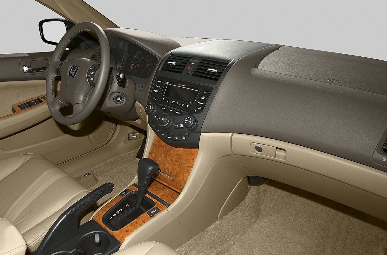Beige interior with wood trim console and automatic gear shift