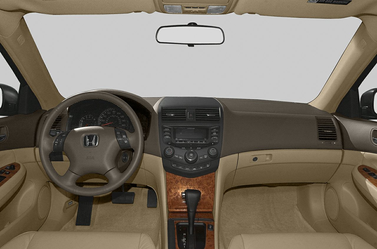 Beige interior with wood trim center console and multifunction steering wheel