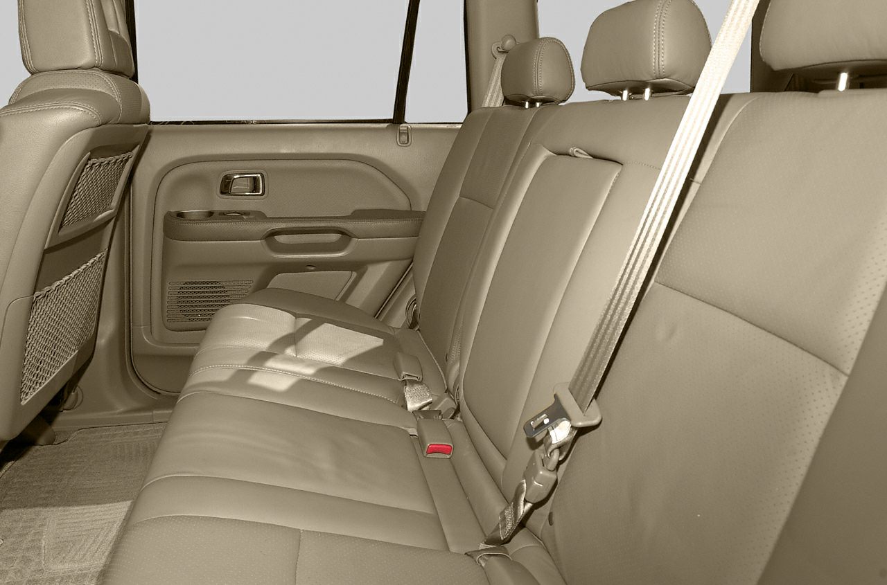 Rear leather seats with seat belts and door panel interior