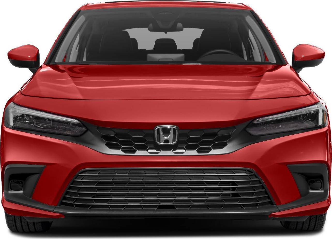 Front view with sleek headlights and honeycomb grille