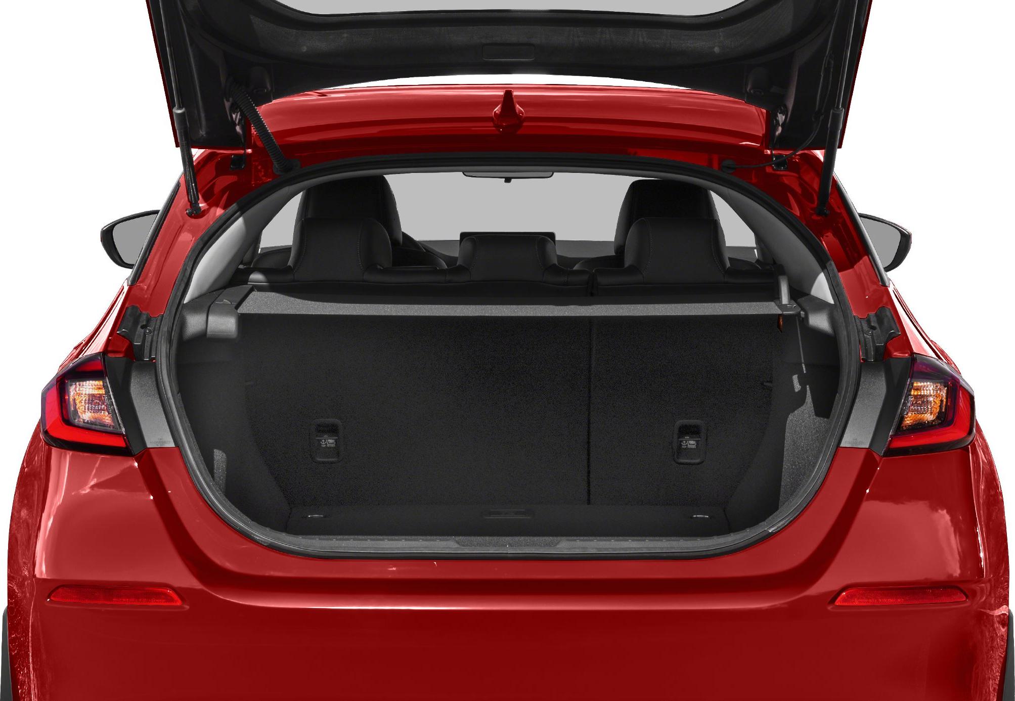 Open rear trunk view showing spacious cargo area and rear seats.