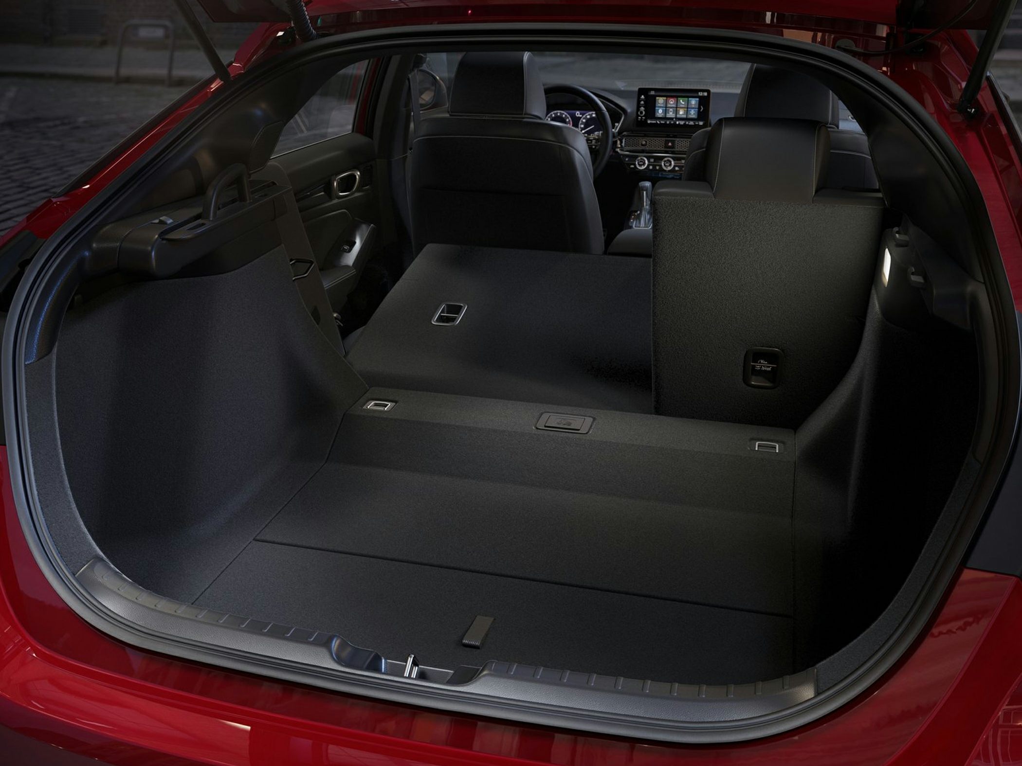 Cargo area with one rear seat folded down for expanded storage space