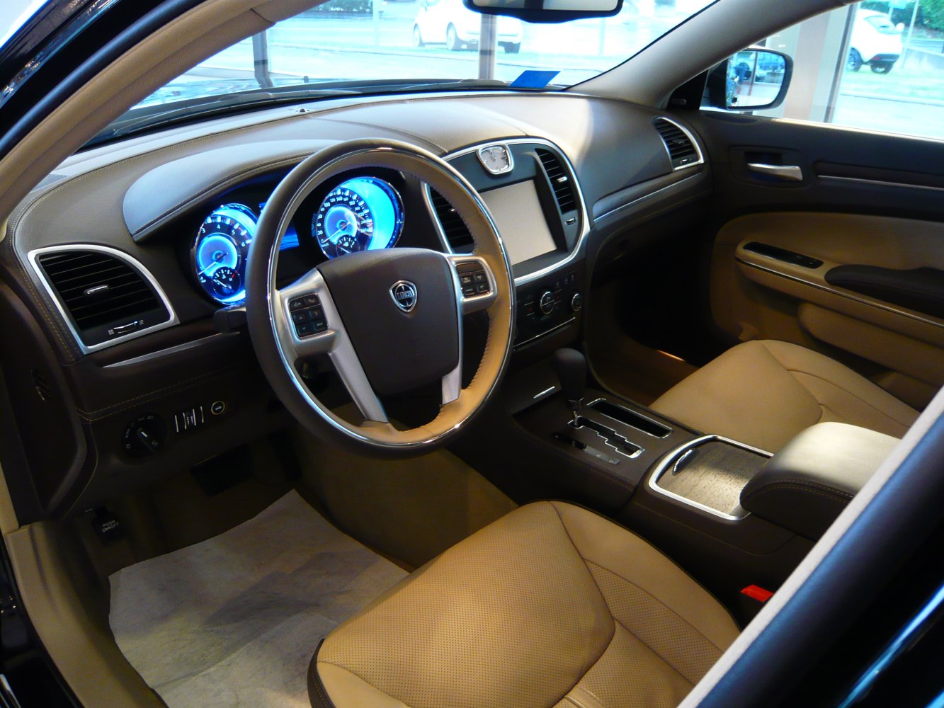 Modern interior with illuminated instrument cluster and multifunction steering wheel