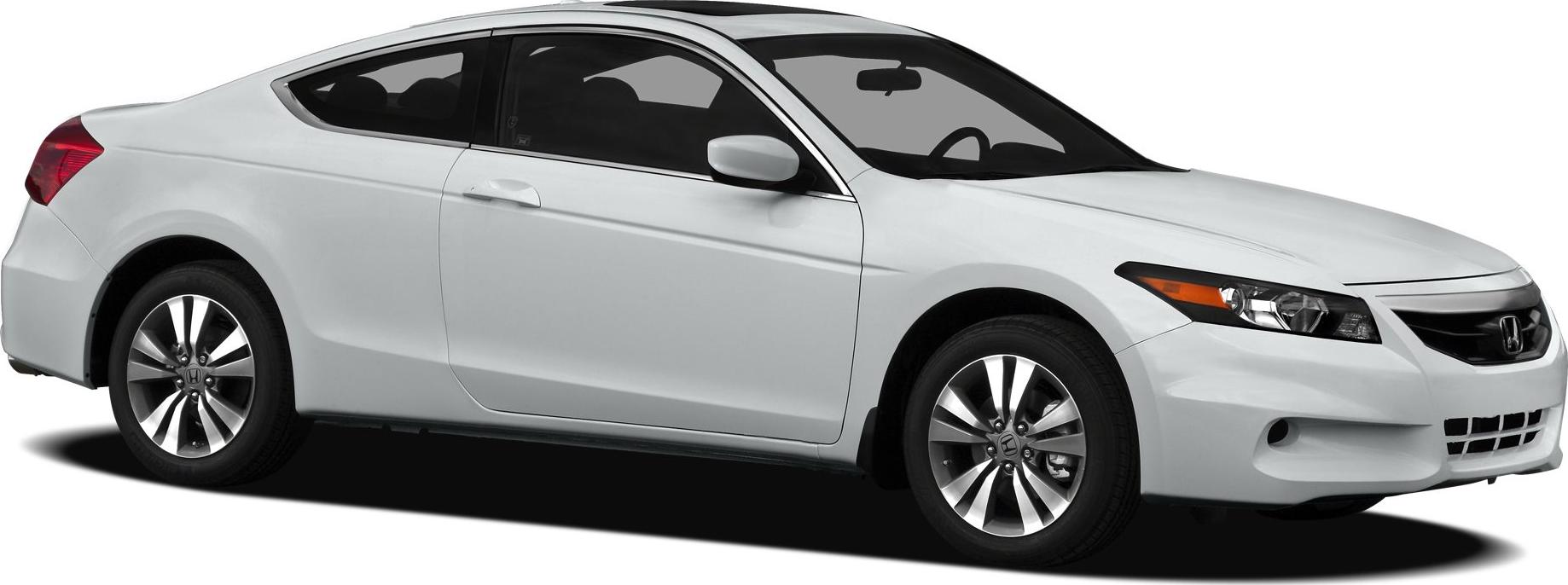 White two-door coupe with alloy wheels and tinted windows.