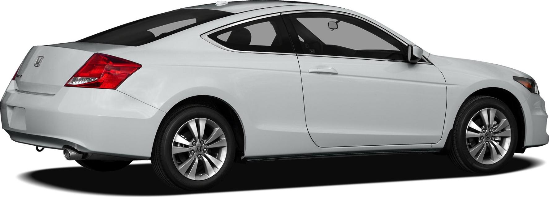Rear side profile of a sporty silver coupe with alloy wheels and distinctive taillights
