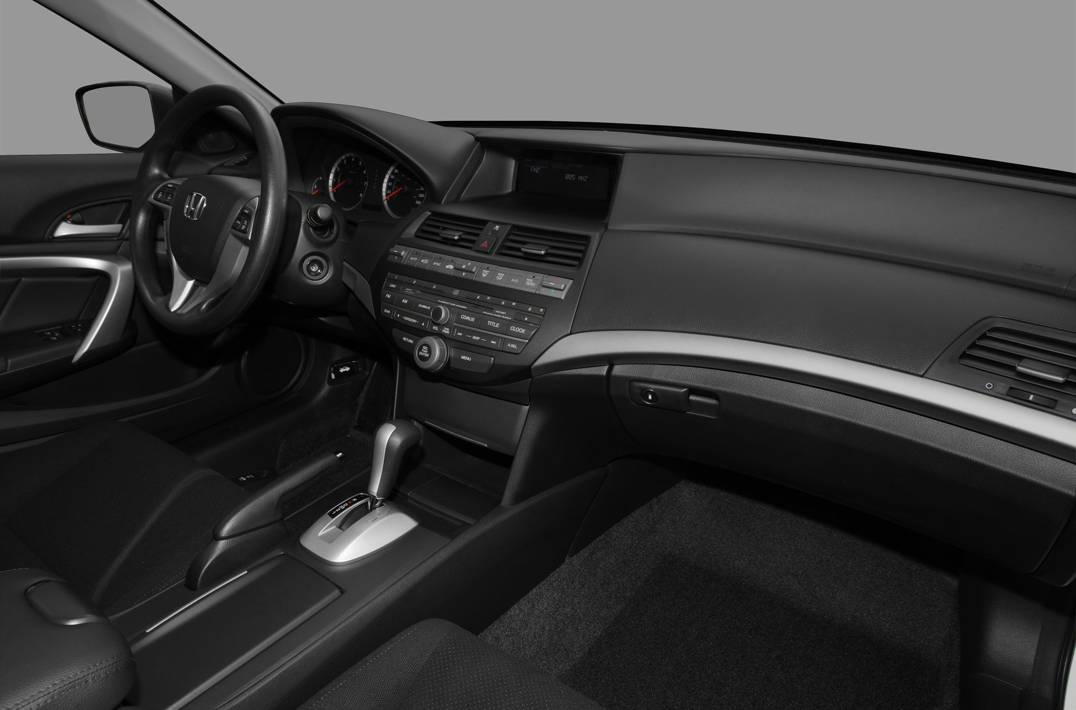 Modern car interior dashboard and center console with steering wheel