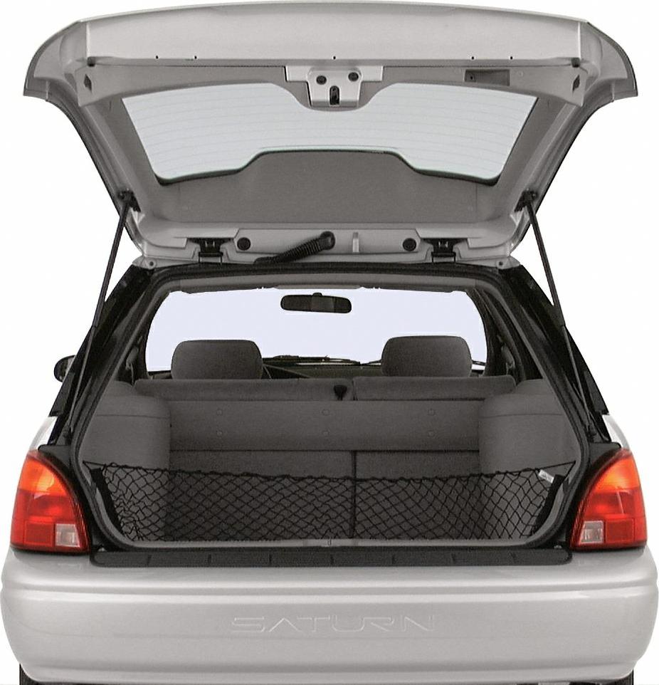 Open hatchback revealing rear cargo space with seats and storage net
