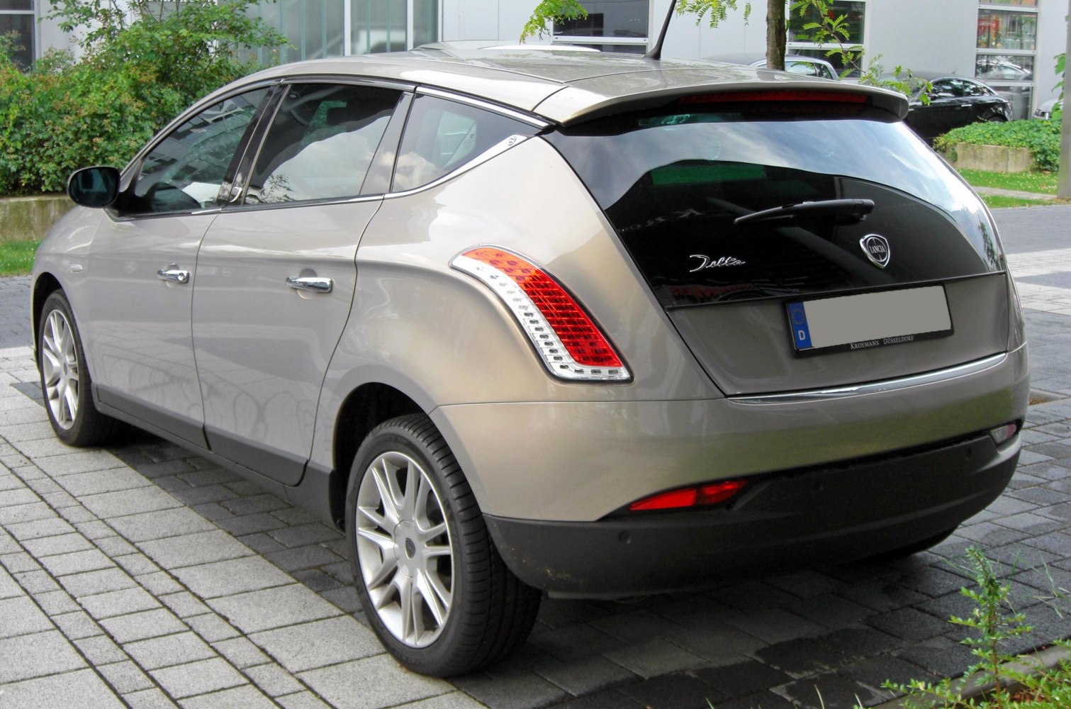 Rear view of car with high-mounted distinctive tail lights and hatchback design
