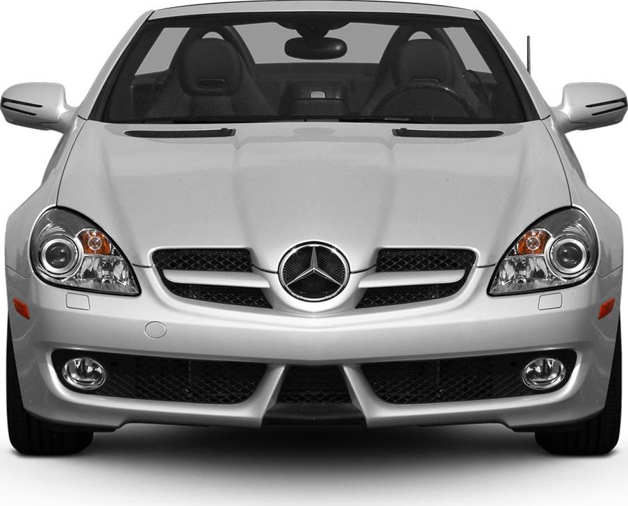 Front view with dual round headlights and prominent grille