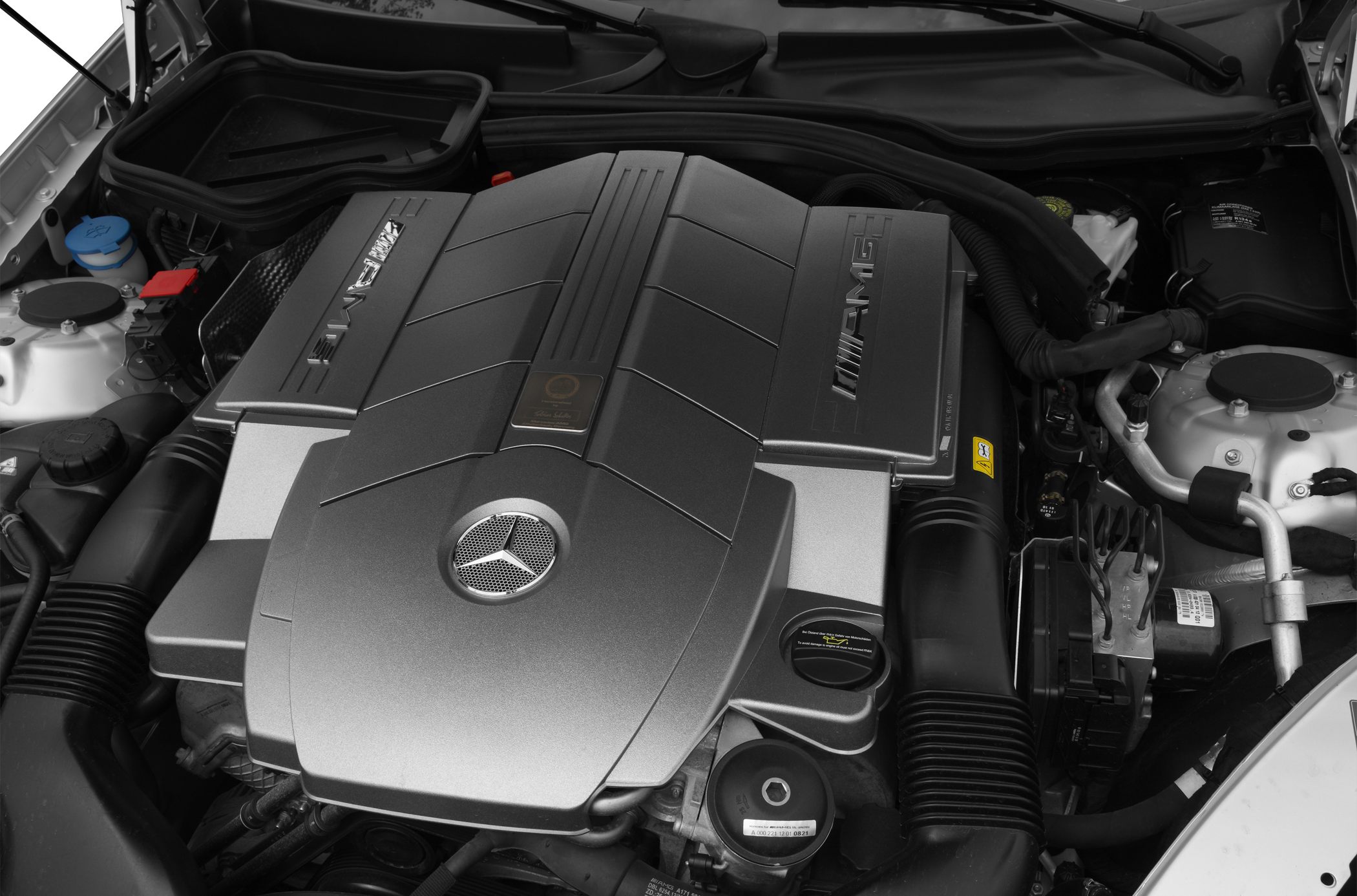 AMG engine cover with Mercedes logo inside engine bay