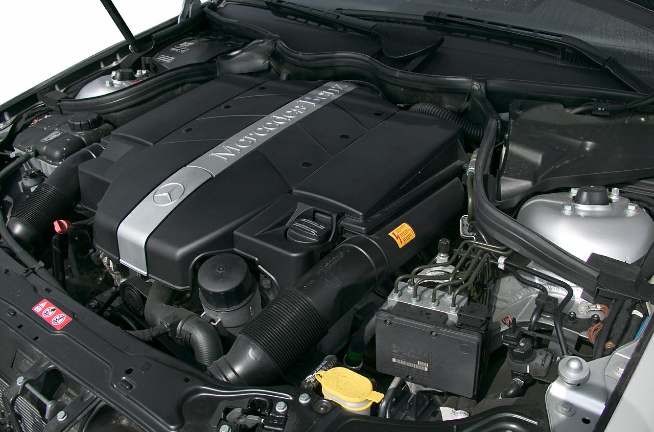 Engine bay with Mercedes-Benz branded engine cover and components
