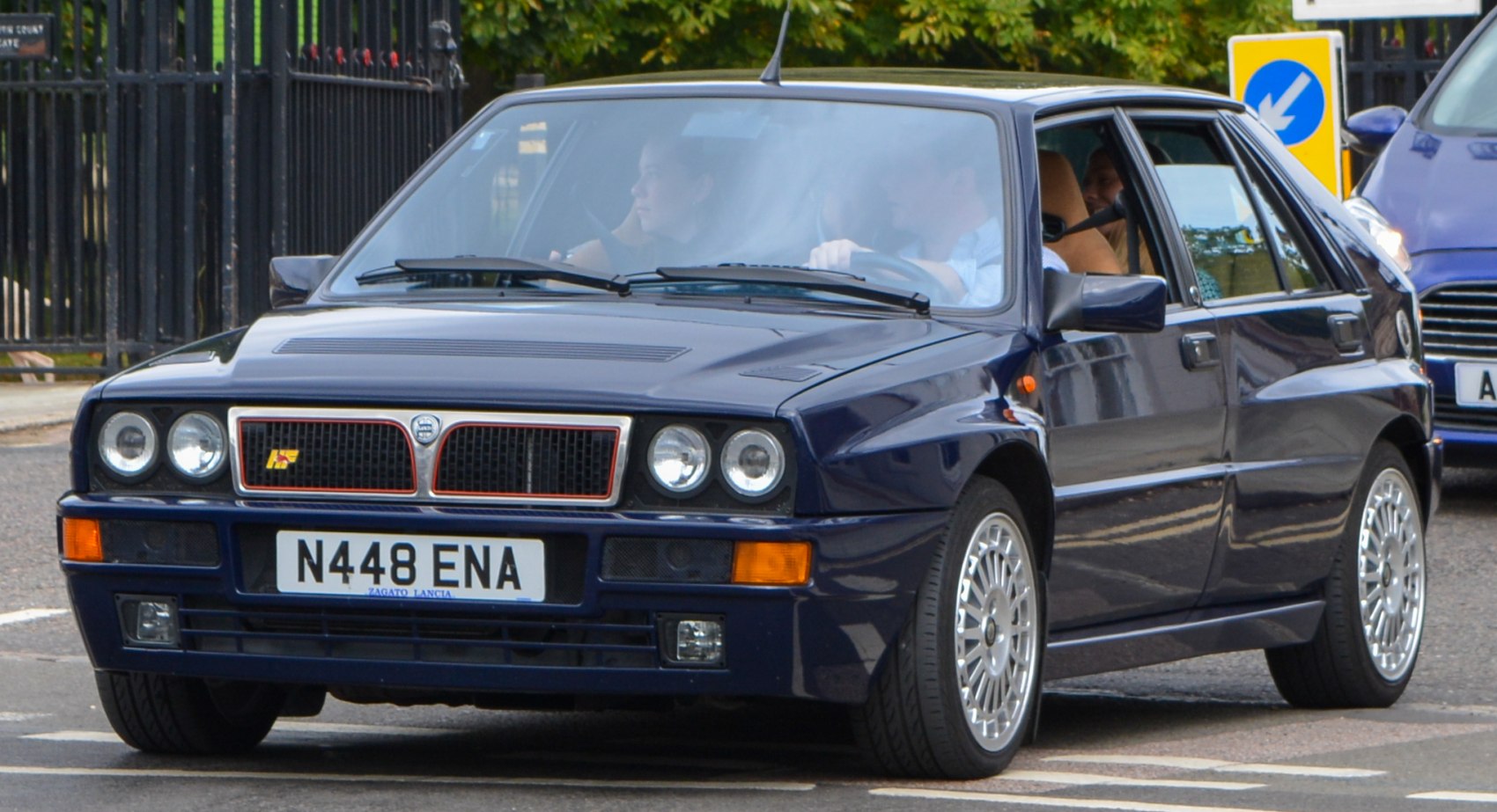 Front view with quad headlights and sporty hatchback design