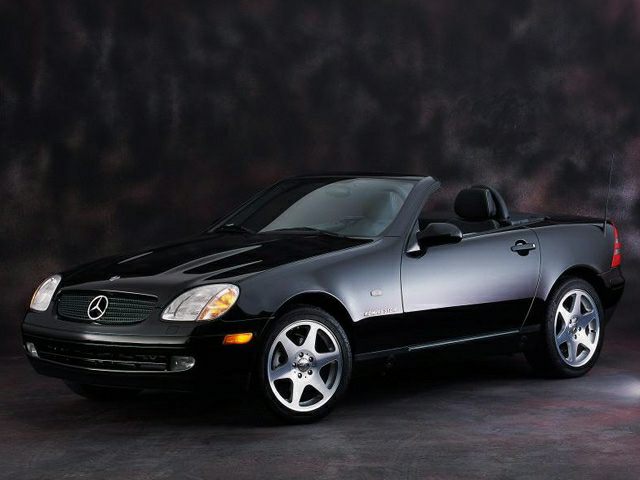 Sporty two-seater convertible with sleek alloy wheels and compact design