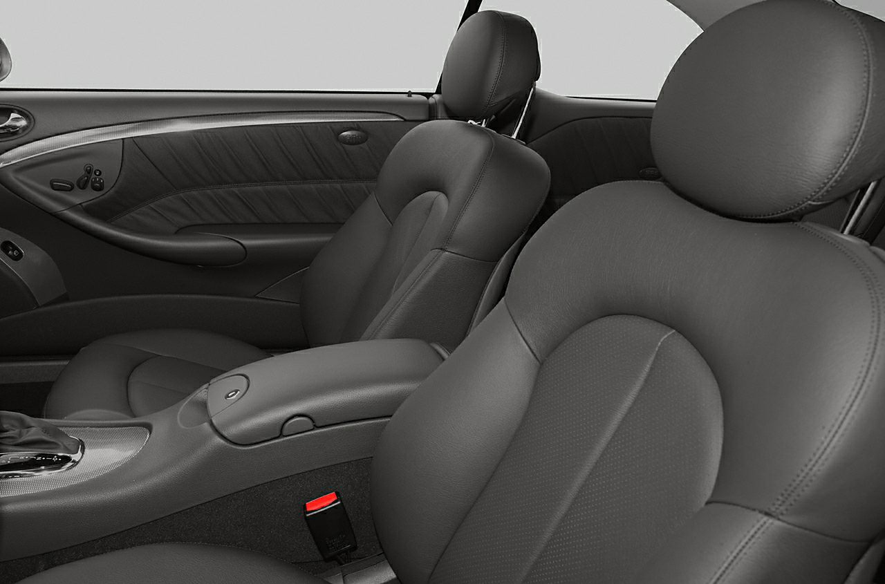 Black leather front seats with door panel and center armrest