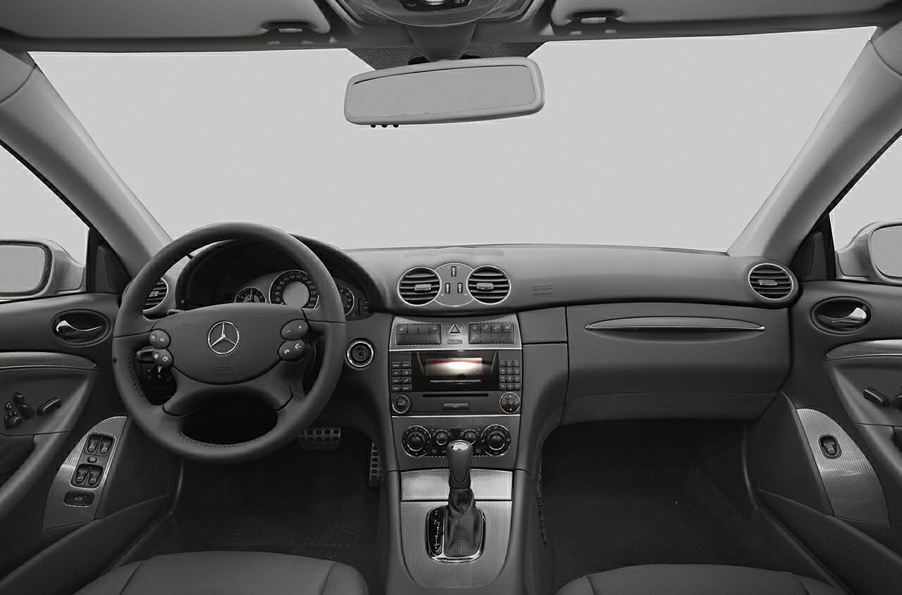 Dashboard and steering wheel of a luxury coupe interior