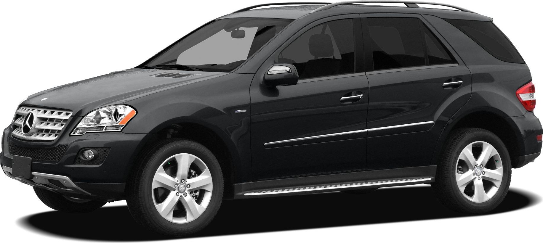 Black luxury SUV with alloy wheels, chrome trim, and running boards