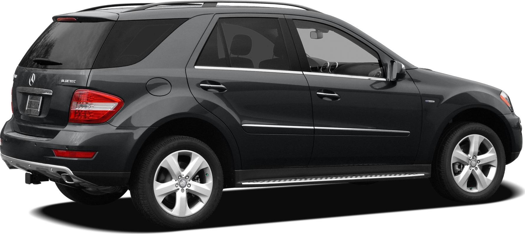 Rear and side profile of black luxury SUV with Bluetec badge and alloy wheels