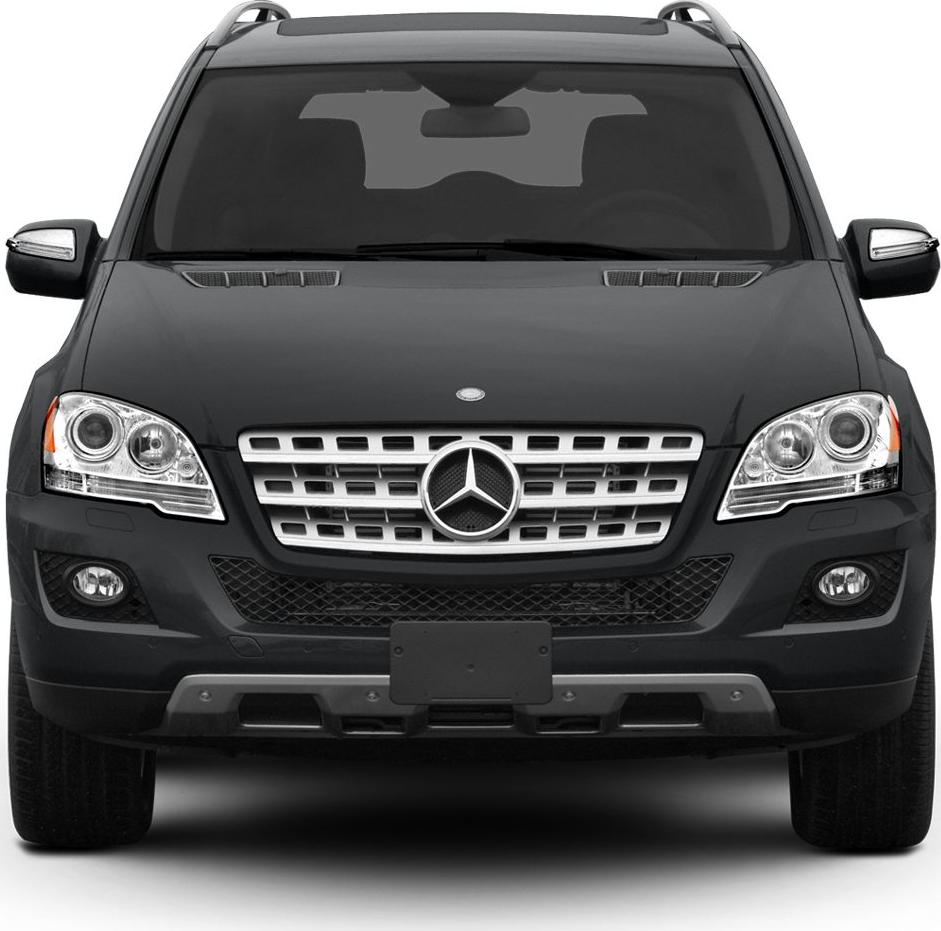 Front view of SUV with chrome grille, headlights, and roof rails
