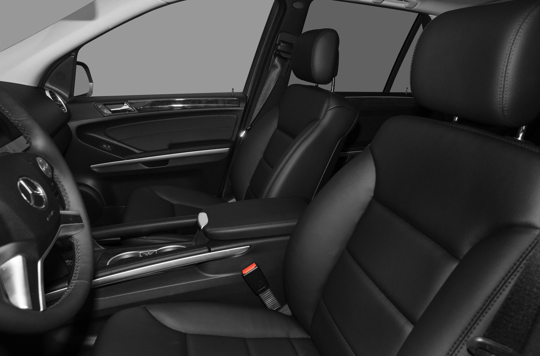 Black leather seats and door panel with wood trim