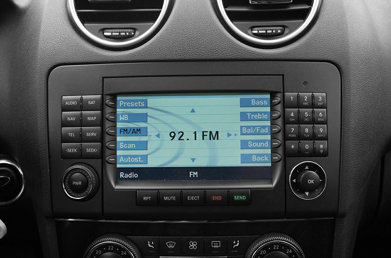 Car stereo with FM radio and multimedia control panel