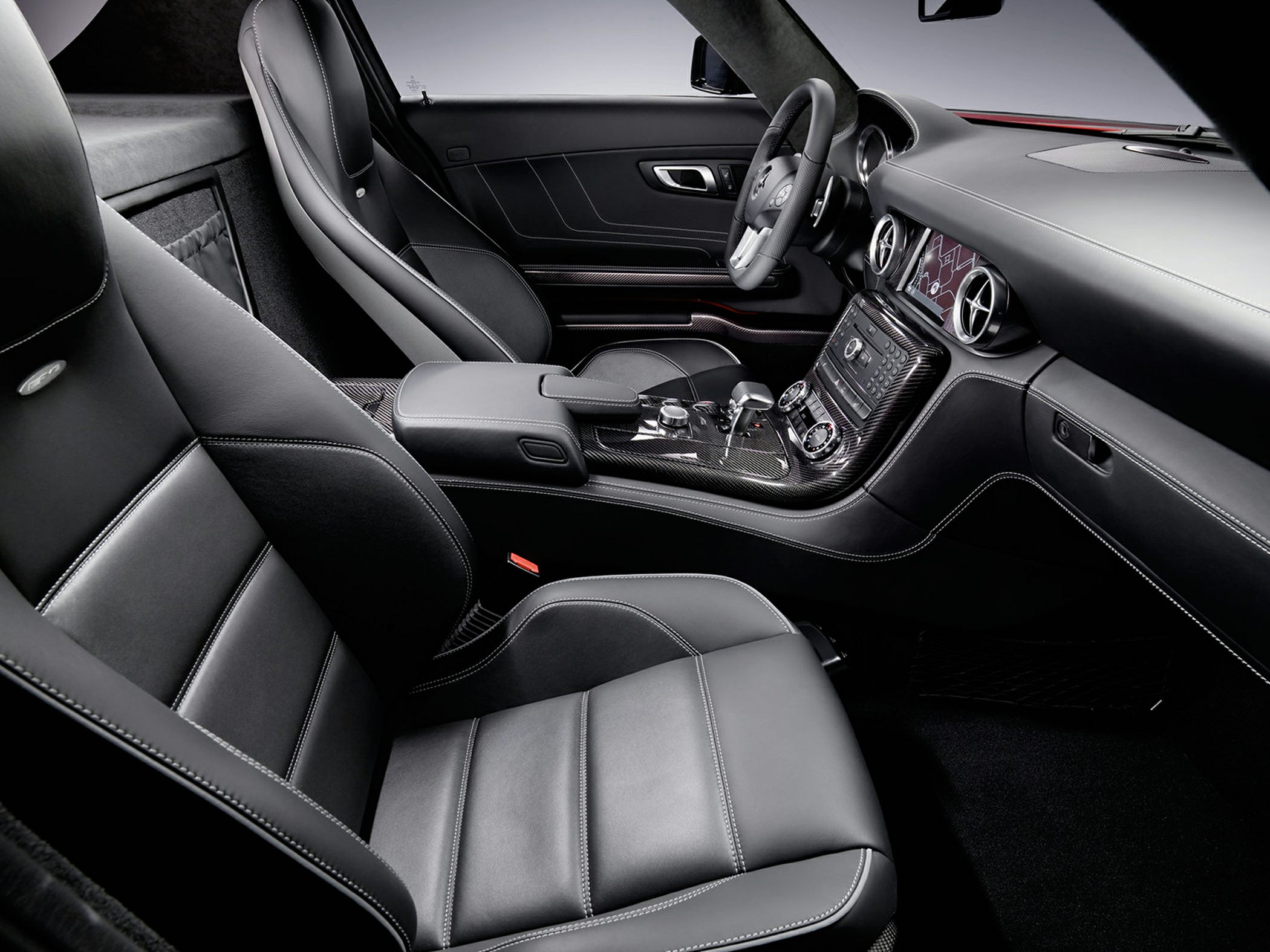 Premium black leather seats and carbon fiber dashboard interior