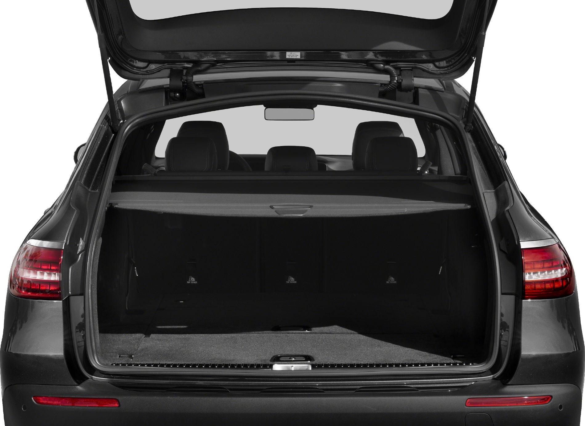 Open rear cargo space with retractable cover in luxury wagon