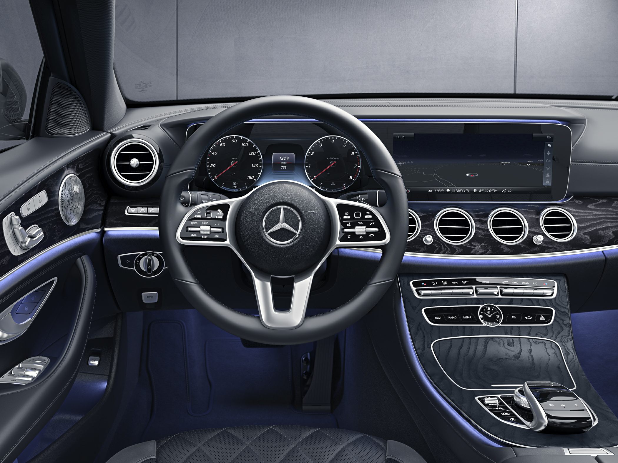 Luxury car interior with digital dashboard and multifunction steering wheel