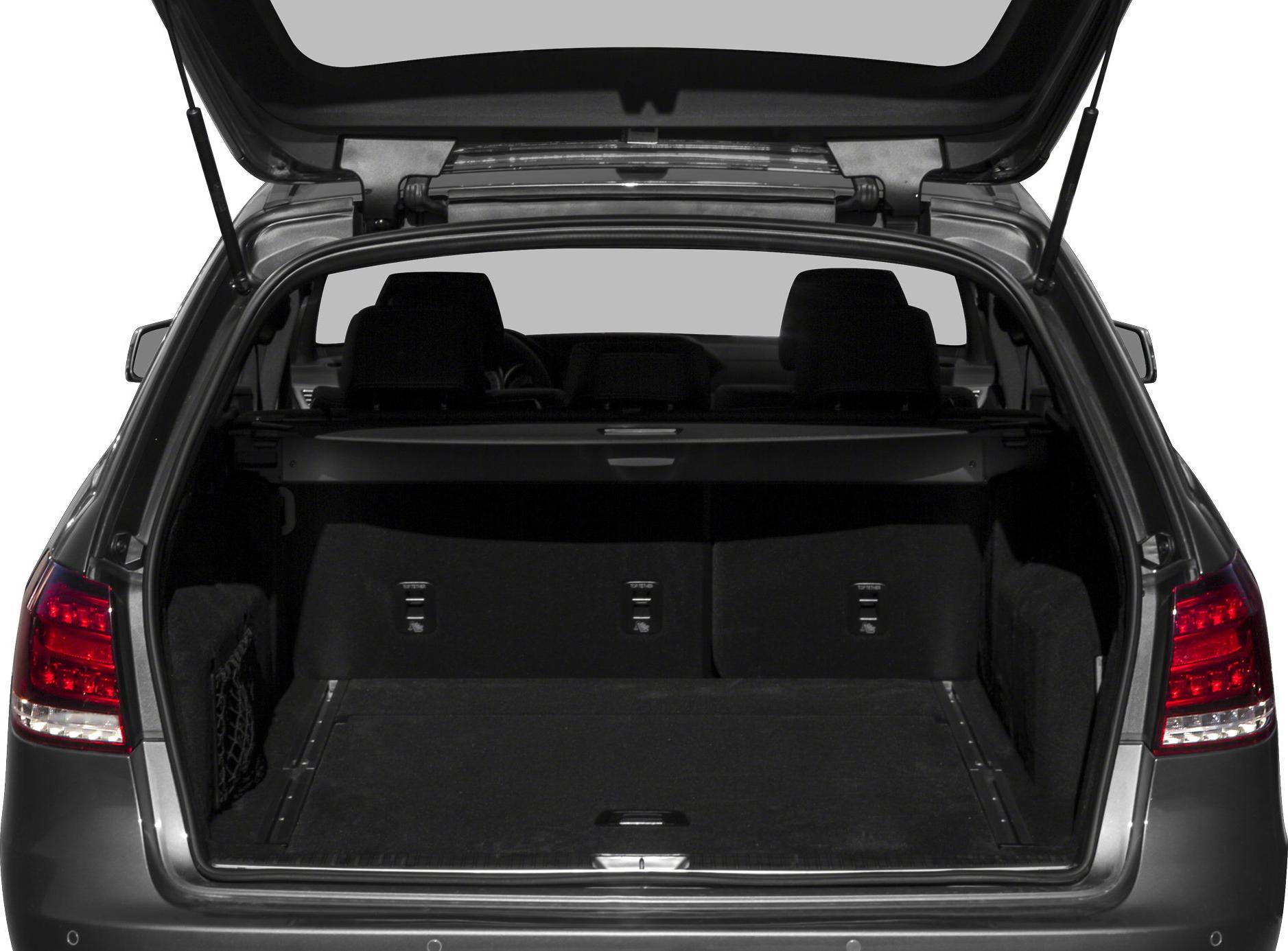Open spacious trunk with rear seats and cargo area.