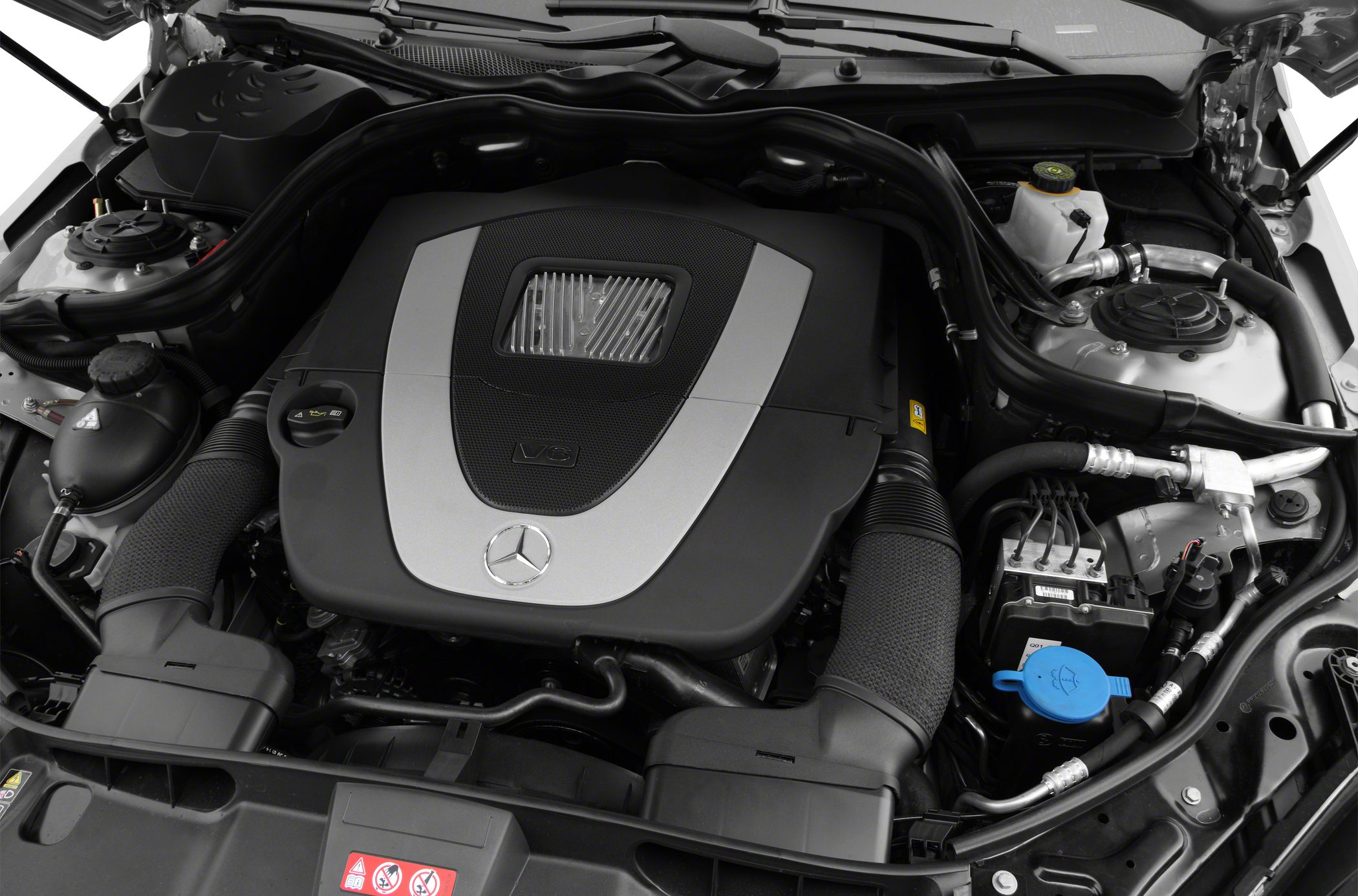 V6 engine compartment showing engine cover and various components