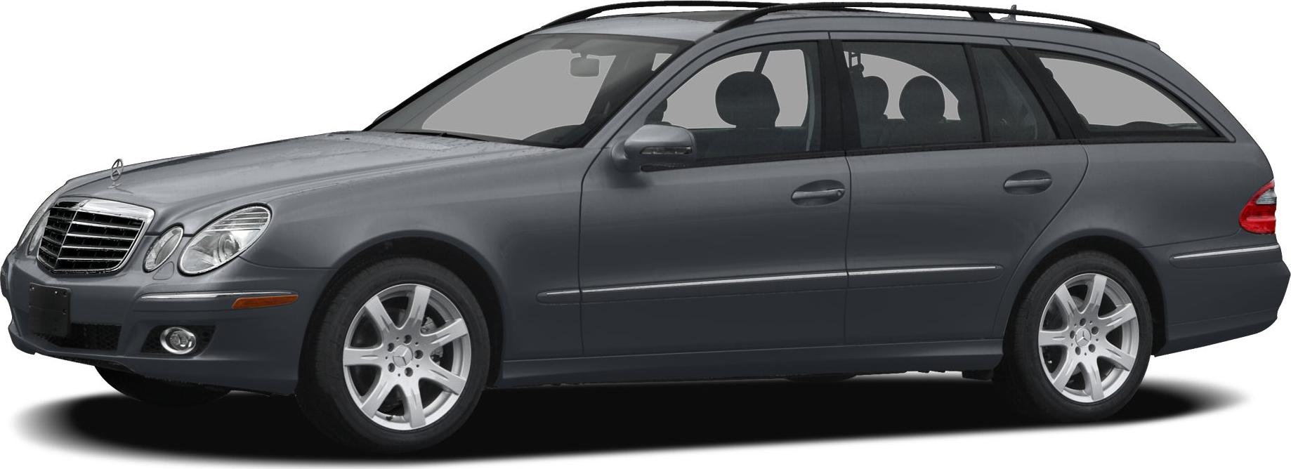 Side profile of a station wagon with distinctive headlights and roof rails