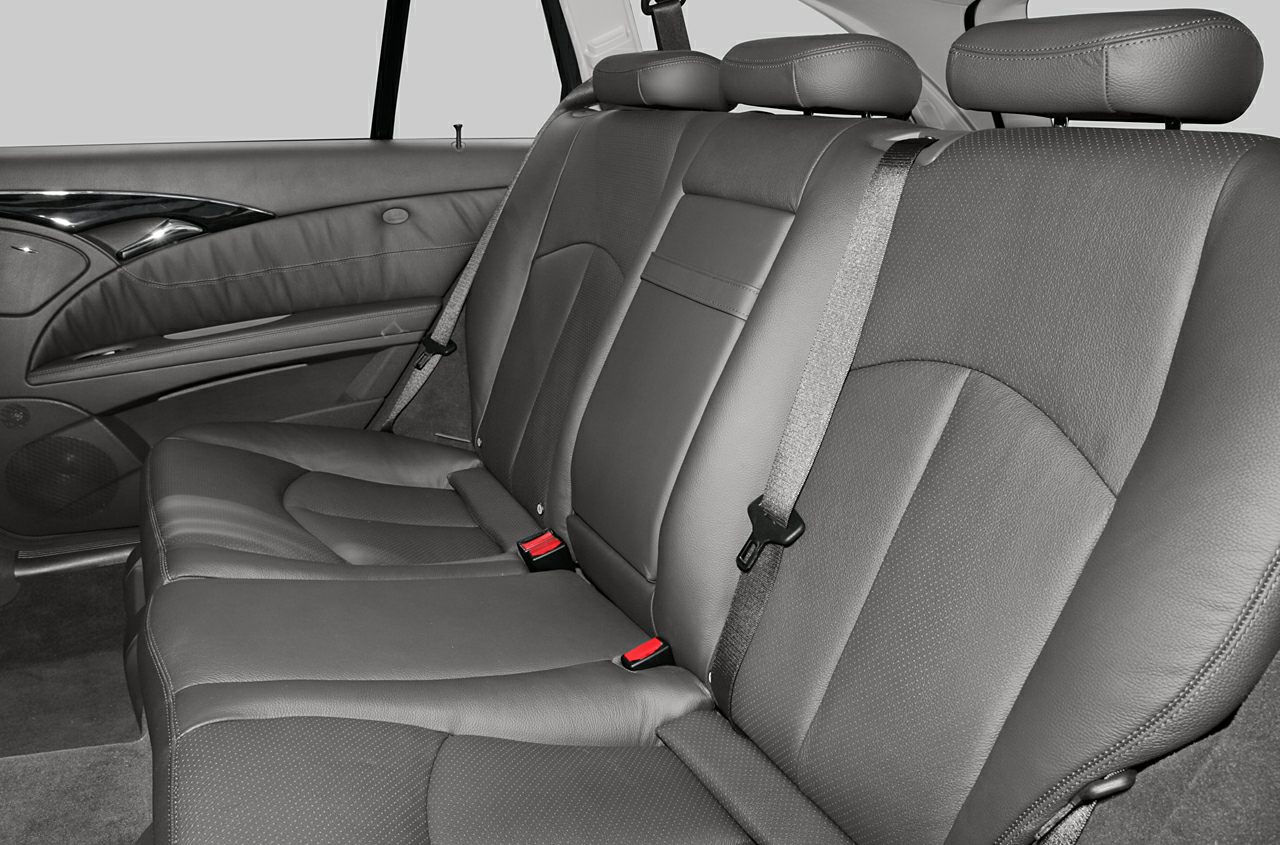 Rear leather seats with headrests and seatbelt details