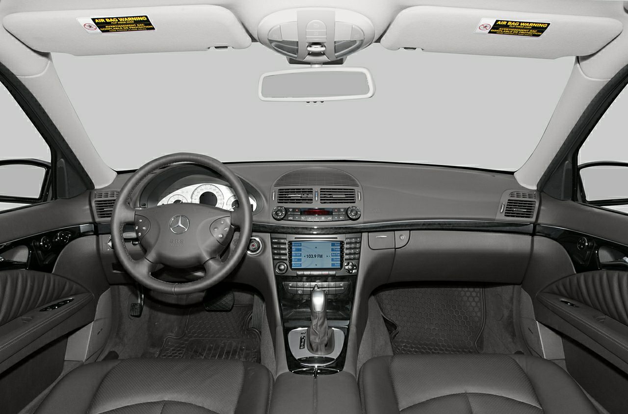 Dashboard and steering wheel with center console and controls