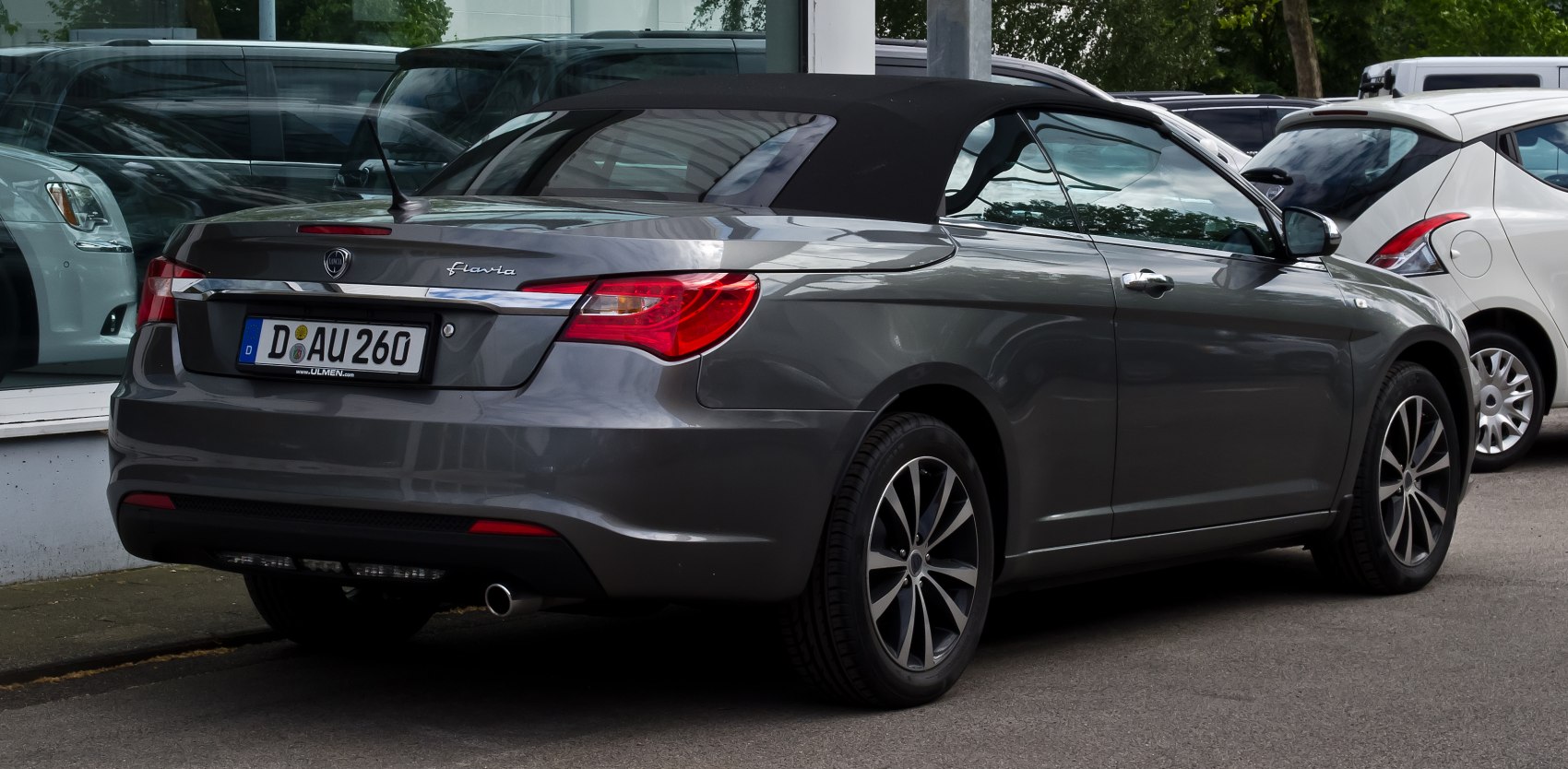 Rear convertible with soft fabric roof and alloy wheels